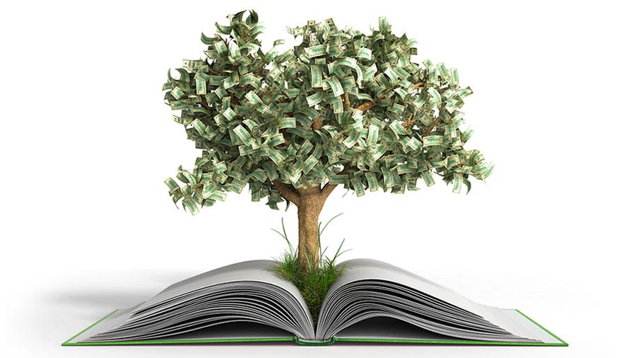 A tree with money for leaves grows out of an open book.