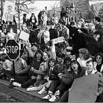 Gallaudet students camp along a busy street during the Deaf President Now protest