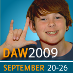 a boy sigms I love you in american sign language