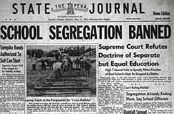 Newspaper headline reads "School Segregation Banned".